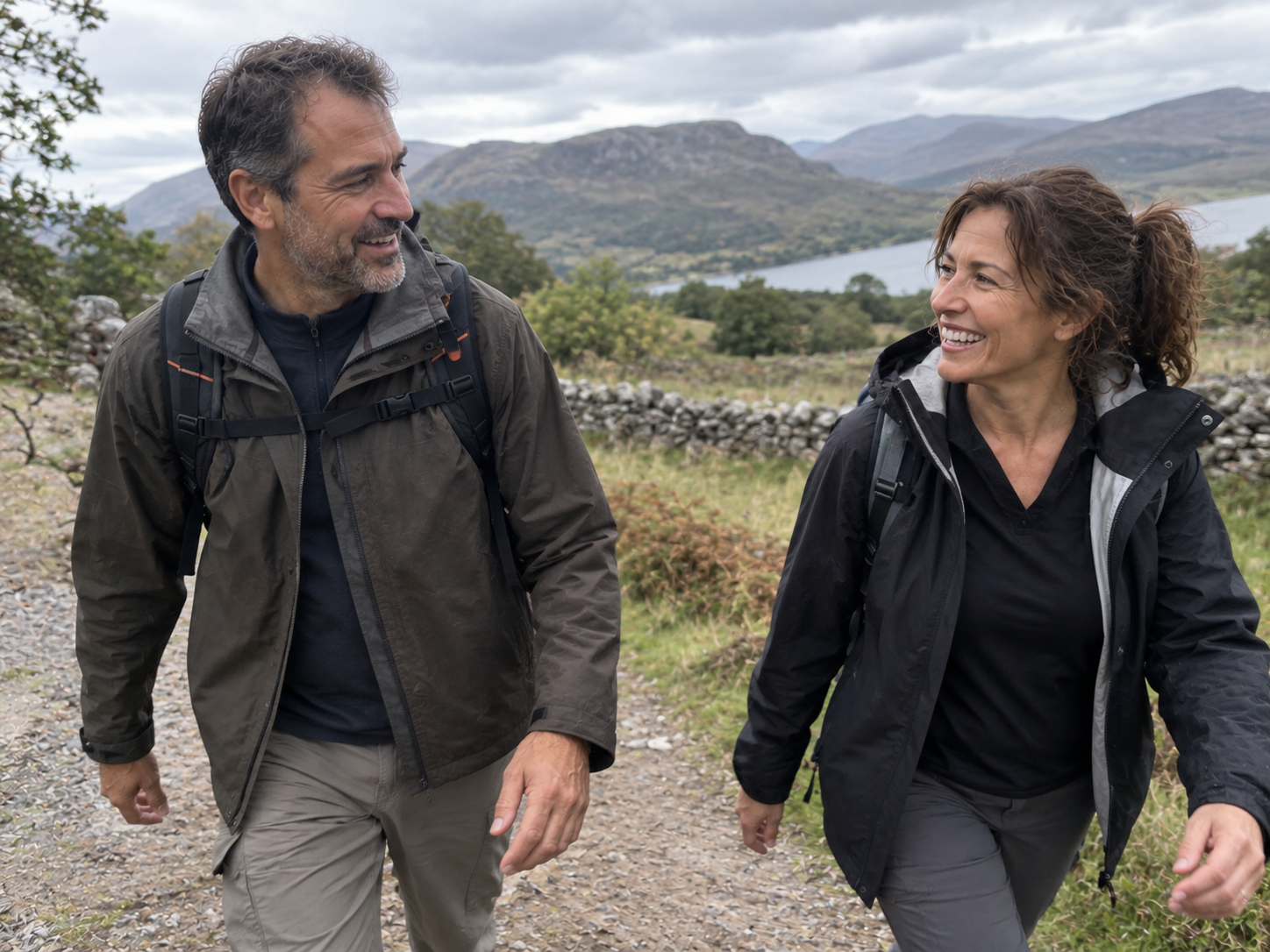 Couple in their late 40s walking together outdoors